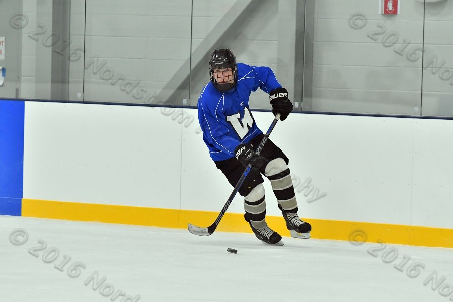 Wheaton College Men\'s Ice Hockey vs Middlesex Community College. - Photo By: KEITH NORDSTROM